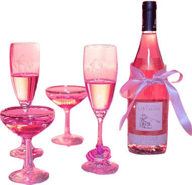 Two white wine flutes, two specialty cocktail glasses, and a wine bottle with a bow, all filled with sunset-pink champagne.