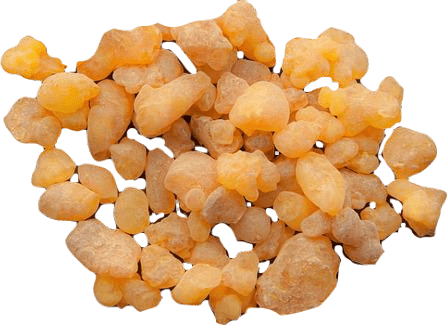 A pile of small light-orange-colored clumps of frankincense or olibanum resin.