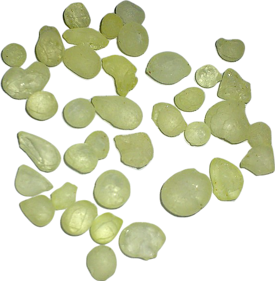 A handful of small, translucent pale-tea-green-colored pebbles of resin from the mastic tree.