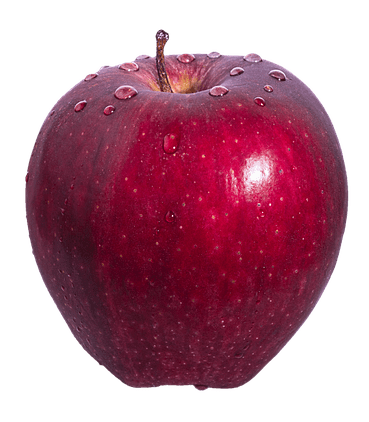 A shiny, bright red delicious apple, with a few drops of water resting on top of it.