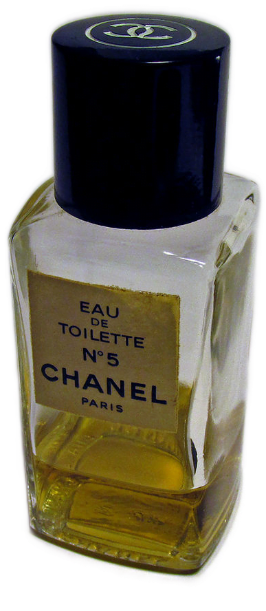 A small vintage glass bottle labeled Chanel Eau de Toilette No. 5, from 1970. It is one-quarter filled with yellow liquid.