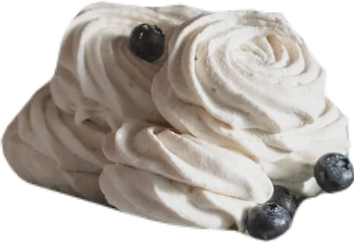 A pile of cream-colored zephyr confections and fresh blueberries.
