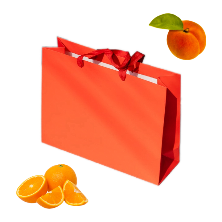 Photo collage of a bright vermilion red-orange paper shopping bag, a bunch of sliced oranges, and a fresh fuzzy peach.
