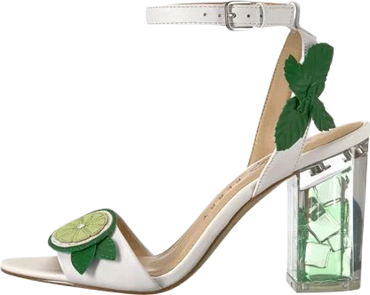 A chunky four inch Katy Perry strappy white high heel sandal with a lime, mint sprig, and green ice cube lucite details.