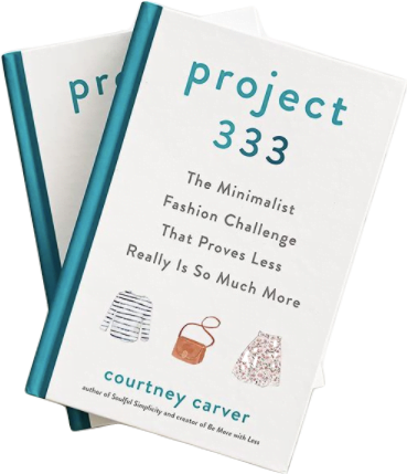 Two copies of the white book with a teal spine called Project 333 by Courtney Carver.